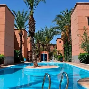 Piscine Palmeraie Hébergement de vacances
